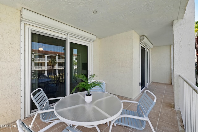 balcony featuring outdoor dining space