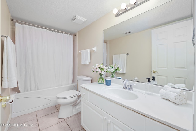 full bath featuring a textured ceiling, visible vents, toilet, and tile patterned flooring