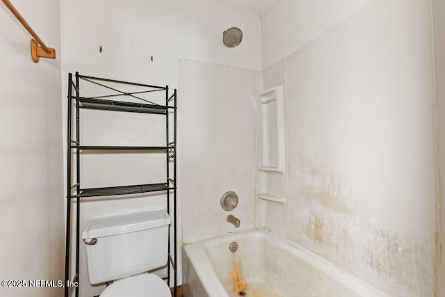 full bathroom featuring toilet and shower / bathtub combination