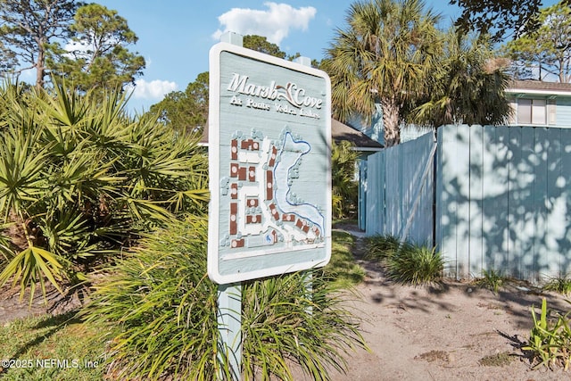 exterior details featuring fence