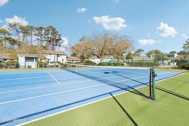 view of sport court featuring community basketball court and fence