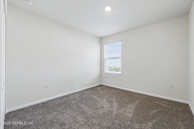 192 Logrono Ct, Saint Augustine, FL 32084 - empty room with baseboards and carpet flooring