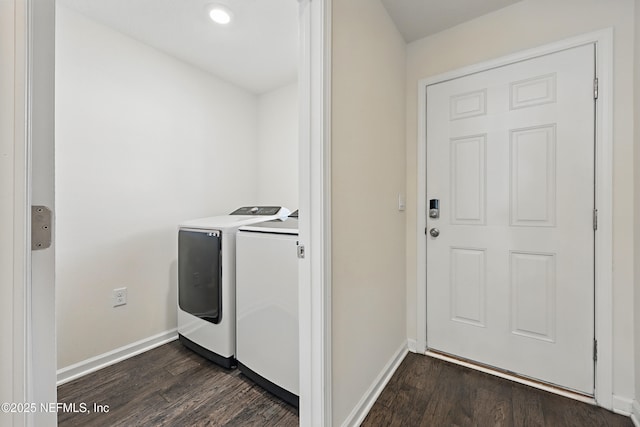 192 Logrono Ct, Saint Augustine, FL 32084 - washroom with dark wood finished floors, laundry area, baseboards, and washing machine and clothes dryer