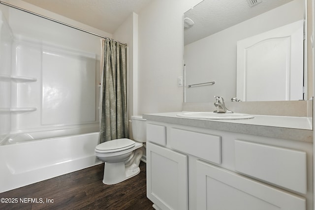 192 Logrono Ct, Saint Augustine, FL 32084 - full bath featuring vanity, shower / bathtub combination with curtain, wood finished floors, a textured ceiling, and toilet