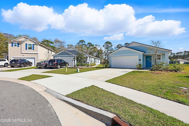 192 Logrono Ct, Saint Augustine, FL 32084 - view of front of house featuring a residential view, an attached garage, concrete driveway, and a front yard