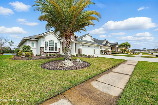 ranch-style home featuring a front yard, stucco siding, a garage, stone siding, and driveway