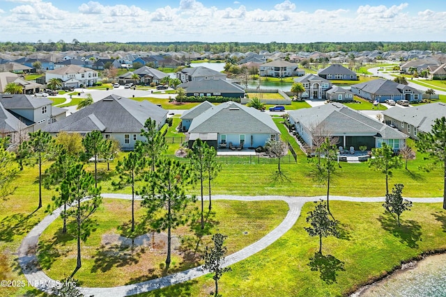 drone / aerial view with a residential view