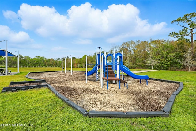 community jungle gym featuring a yard