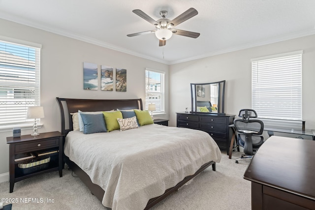 bedroom with light colored carpet, ceiling fan, and ornamental molding