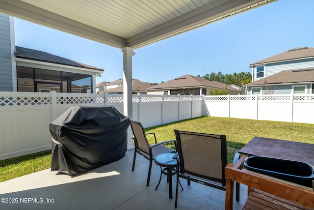 view of patio / terrace featuring a fenced backyard and grilling area