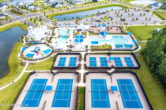 aerial view with a residential view and a water view