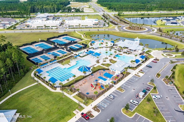 bird's eye view with a water view