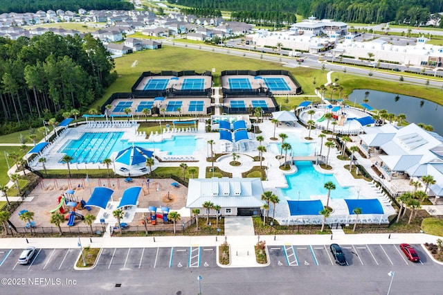 bird's eye view with a water view