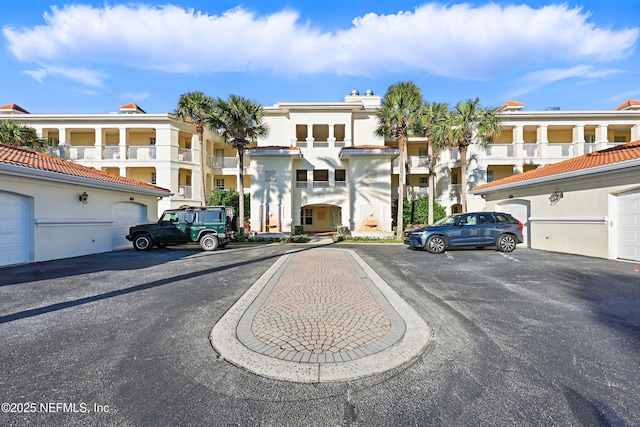 view of road with community garages