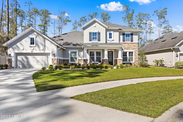 view of front facade featuring stone siding, stucco siding, and driveway