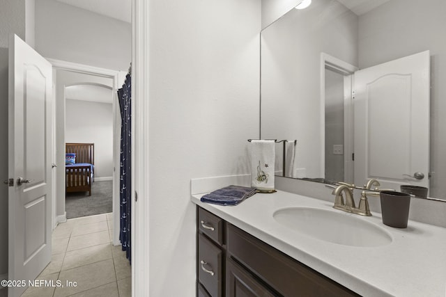 bathroom with vanity and tile patterned floors