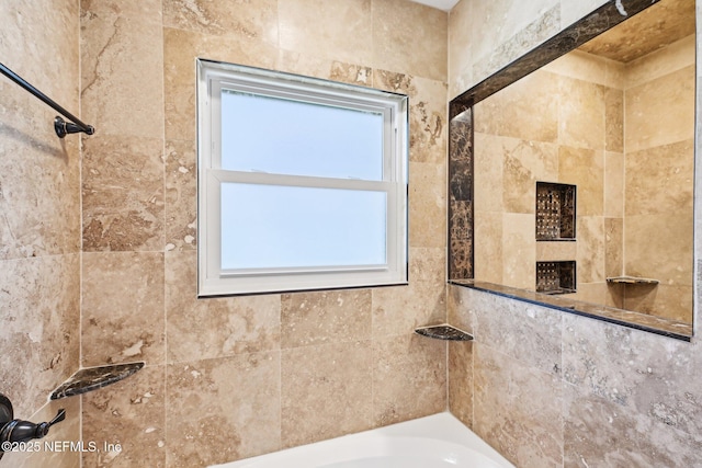 full bathroom with a shower and a tub