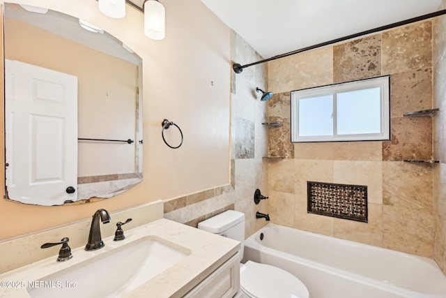 full bathroom featuring vanity, toilet, and shower / bath combination