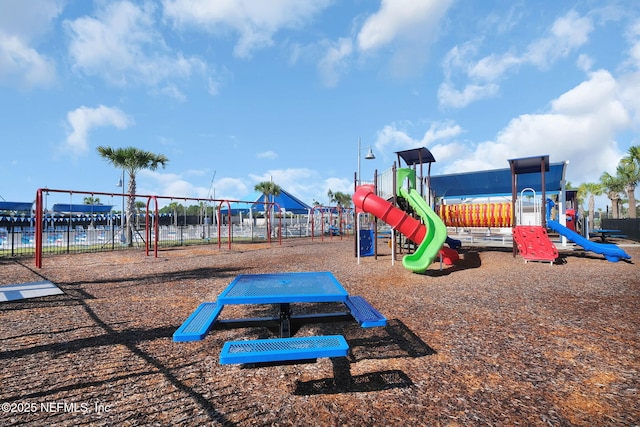 community play area featuring fence