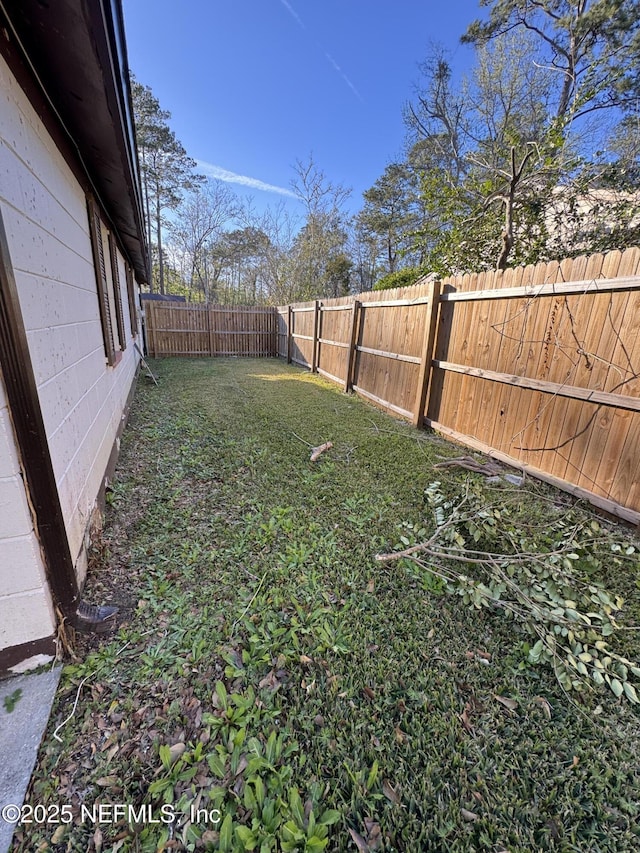 view of yard featuring a fenced backyard