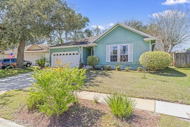 ranch-style home featuring a garage, driveway, a front lawn, and fence