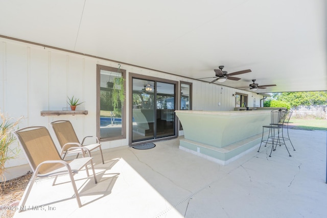 view of patio / terrace featuring a ceiling fan