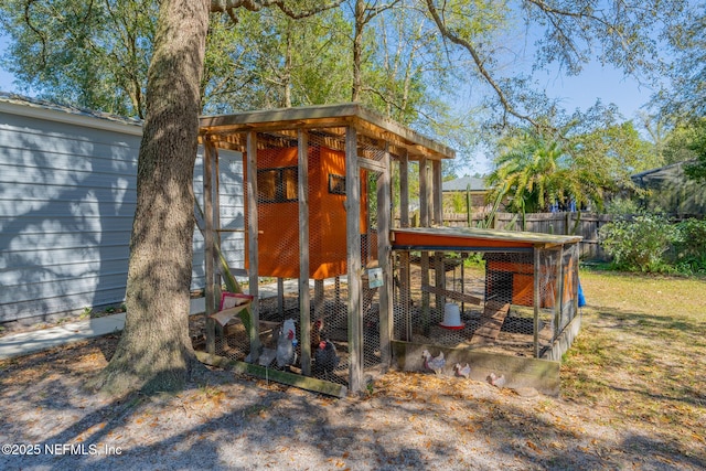 view of poultry coop with fence