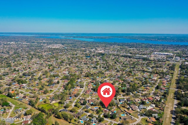 bird's eye view with a residential view and a water view