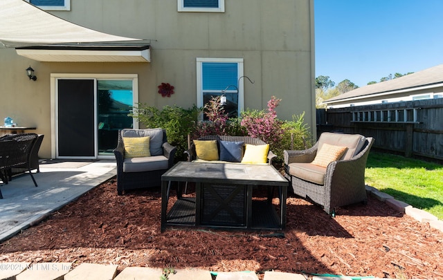 view of patio / terrace with fence