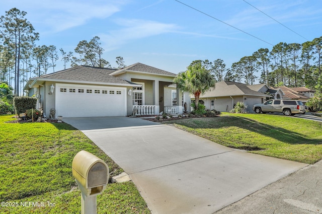 view of front of house featuring a garage, covered porch, concrete driveway, and a front yard