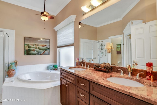 full bath with a sink, a tub with jets, a stall shower, and crown molding