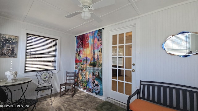 living area with ceiling fan