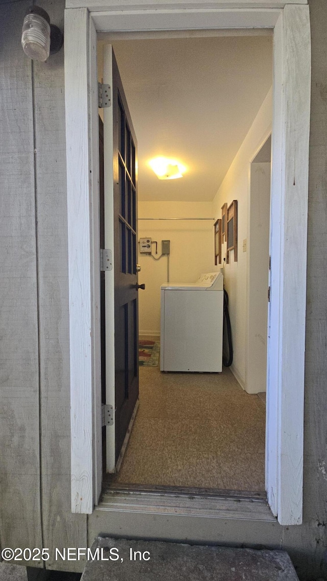 hallway featuring washer / clothes dryer