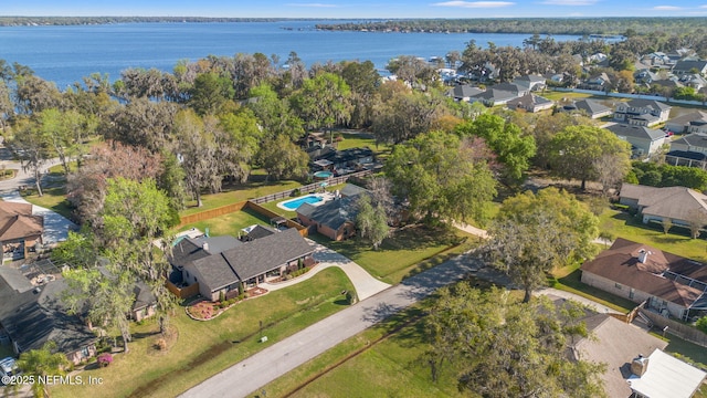 bird's eye view with a residential view and a water view