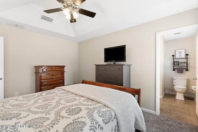 bedroom featuring tile patterned flooring, carpet, visible vents, and baseboards