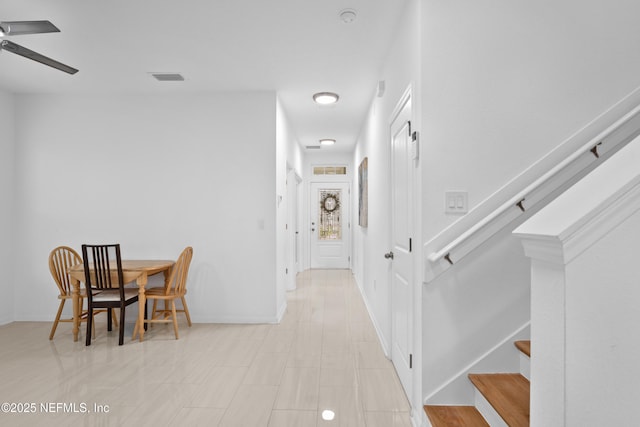 54 Ness Cir, Saint Augustine, FL 32095 - hall with visible vents, stairs, and baseboards