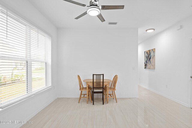 54 Ness Cir, Saint Augustine, FL 32095 - dining area with visible vents, a ceiling fan, and baseboards