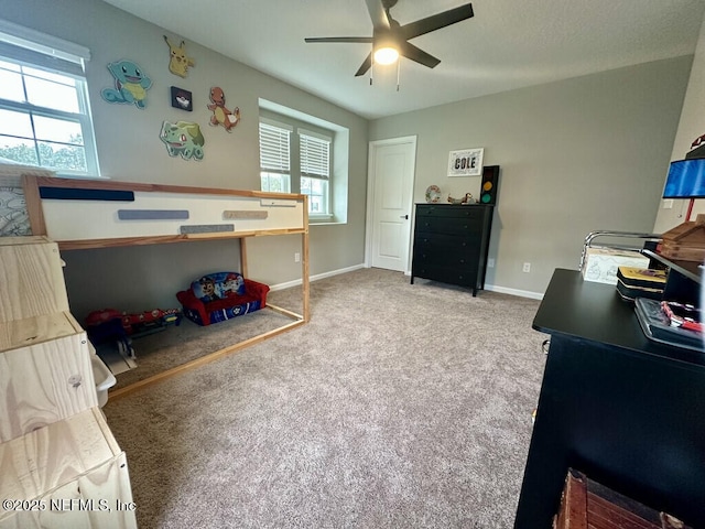 carpeted bedroom with baseboards