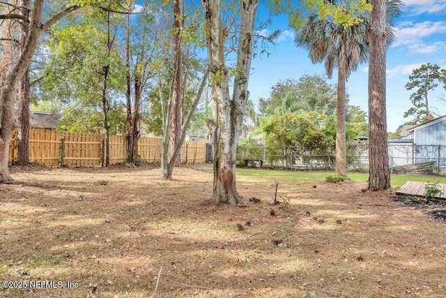 view of yard with fence