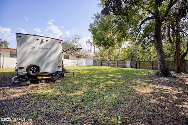 view of yard featuring fence