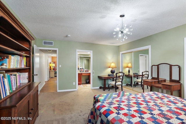 bedroom with baseboards, visible vents, a textured ceiling, light carpet, and a chandelier