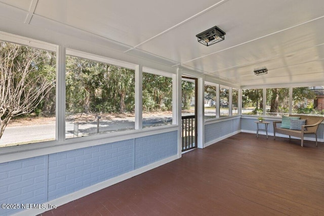 unfurnished sunroom with a wealth of natural light