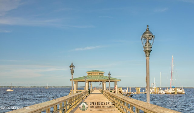 dock area featuring a gazebo and a water view