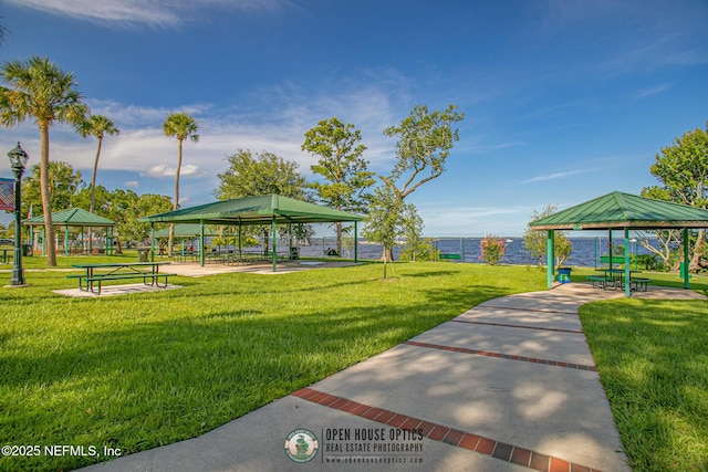 surrounding community with a gazebo and a lawn