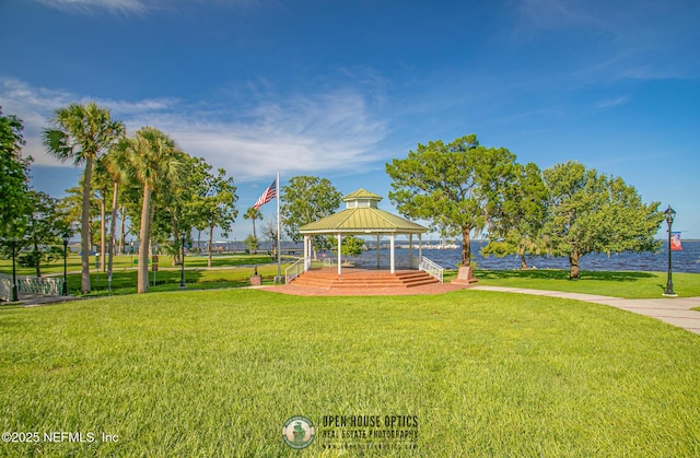 surrounding community with a gazebo and a lawn