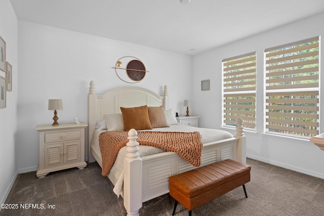 bedroom featuring baseboards and carpet floors