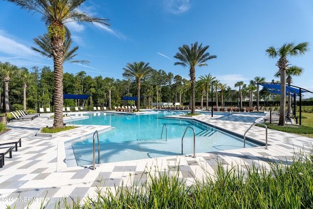 community pool featuring a patio area