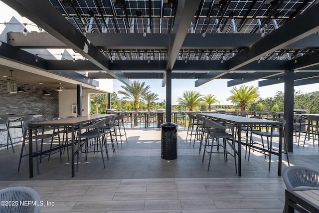 view of patio / terrace featuring outdoor dining space and a pergola