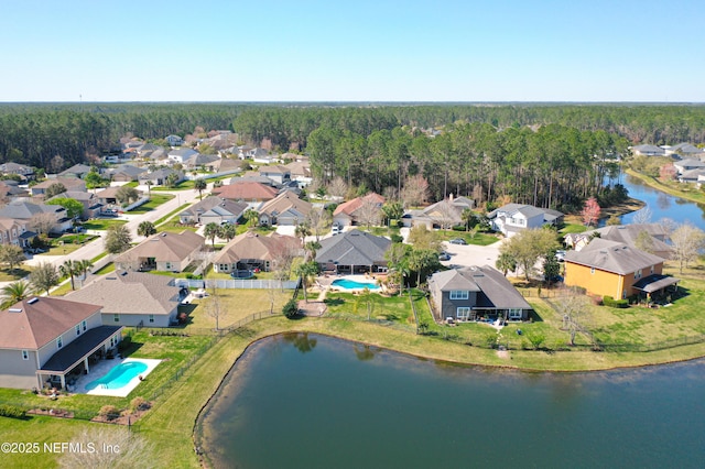 aerial view featuring a water view and a residential view