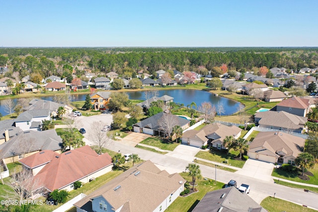 birds eye view of property featuring a residential view and a water view